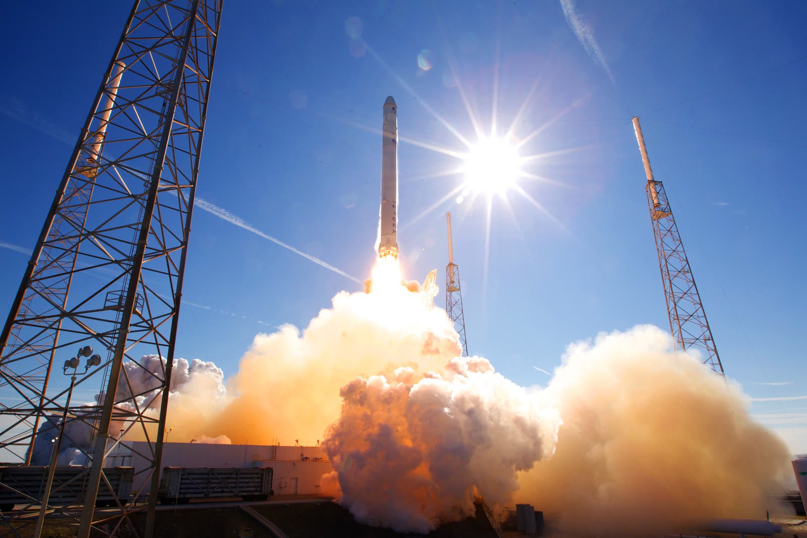 Falcon 9 carrying the first Dragon spacecraft climbing away from Cape Canaveral