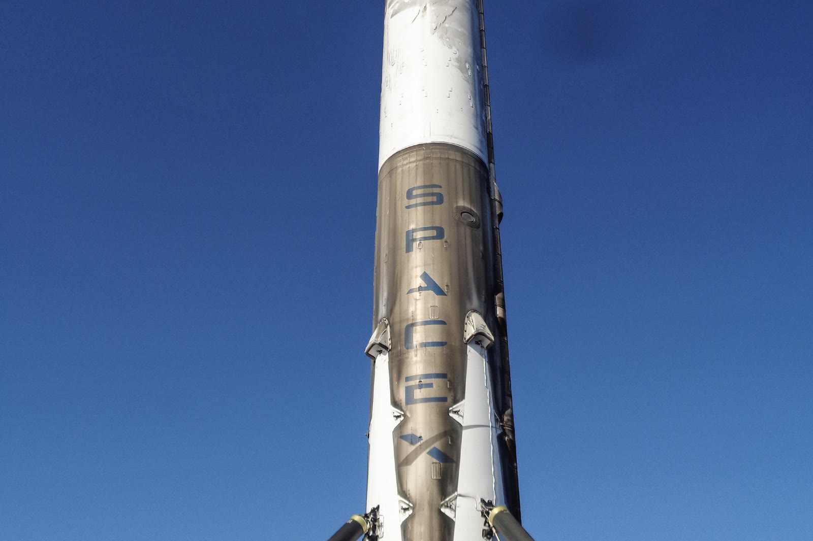 The JCSAT-14 Falcon 9 first stage standing on the droneship after a high-energy landing