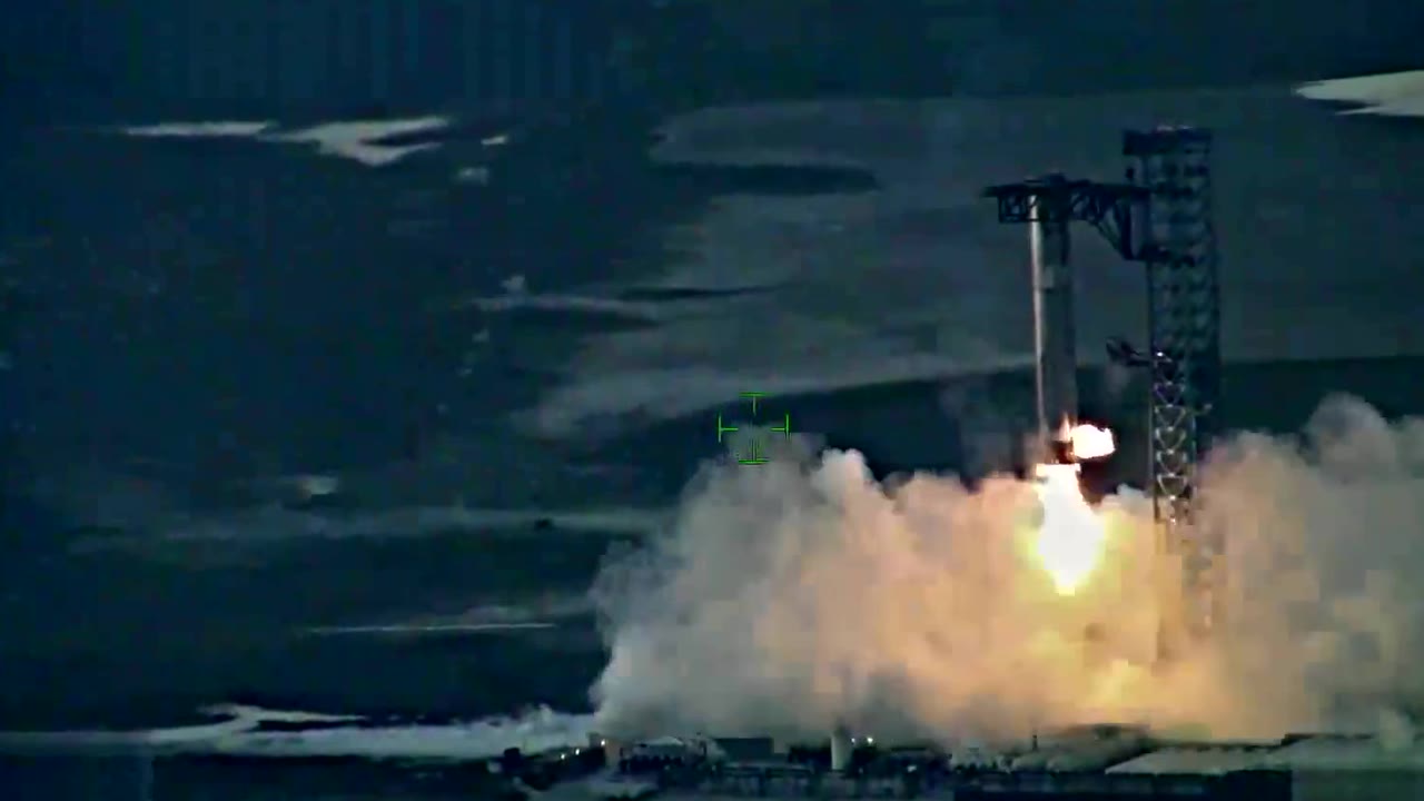 Super Heavy booster descending onto the launch tower arms at Starbase, seen from a surveillance aerostat, October 13 2024